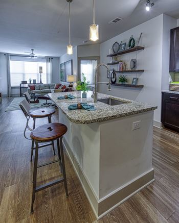 Kitchen with Granite islands at 4700 Colonnade Apartments in Birmingham, AL